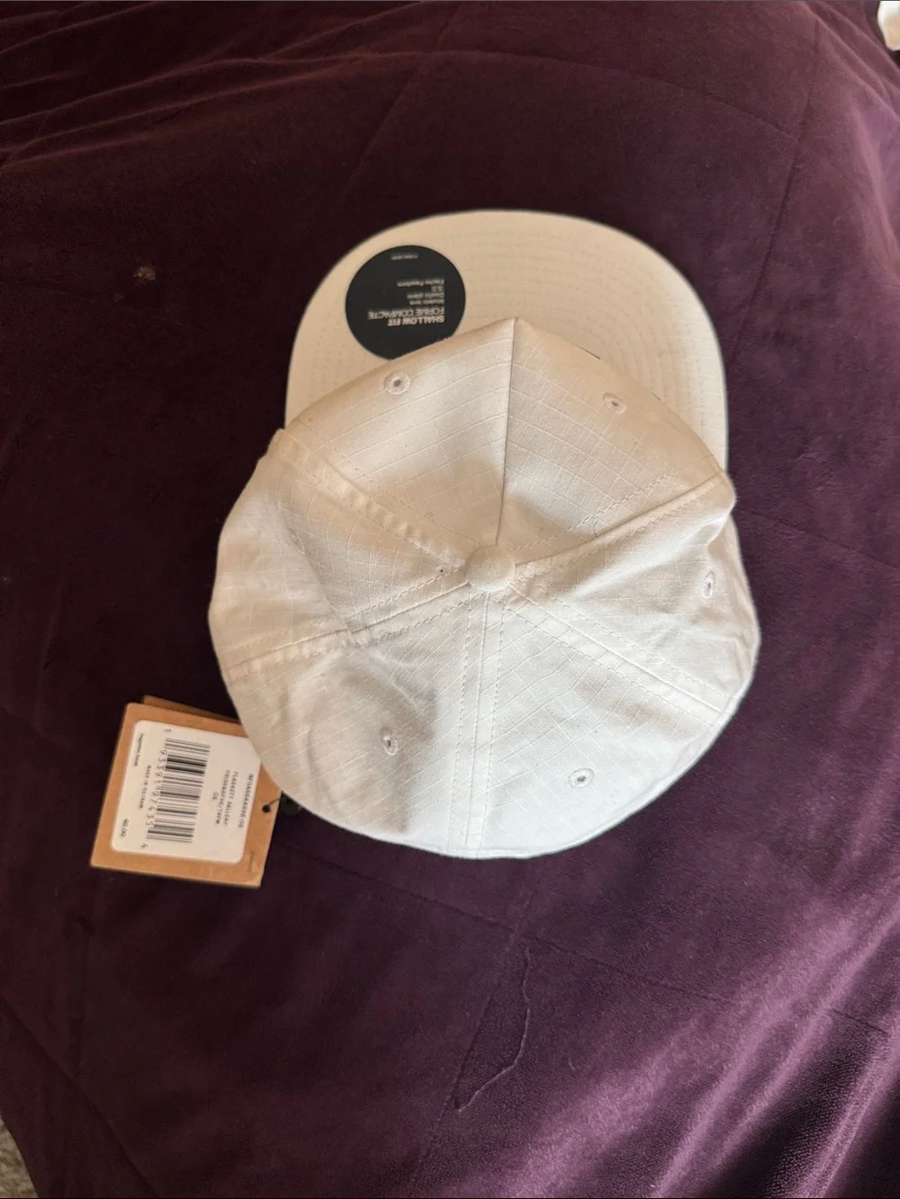 The North Face White Baseball Cap with Rainbow Logo Accent